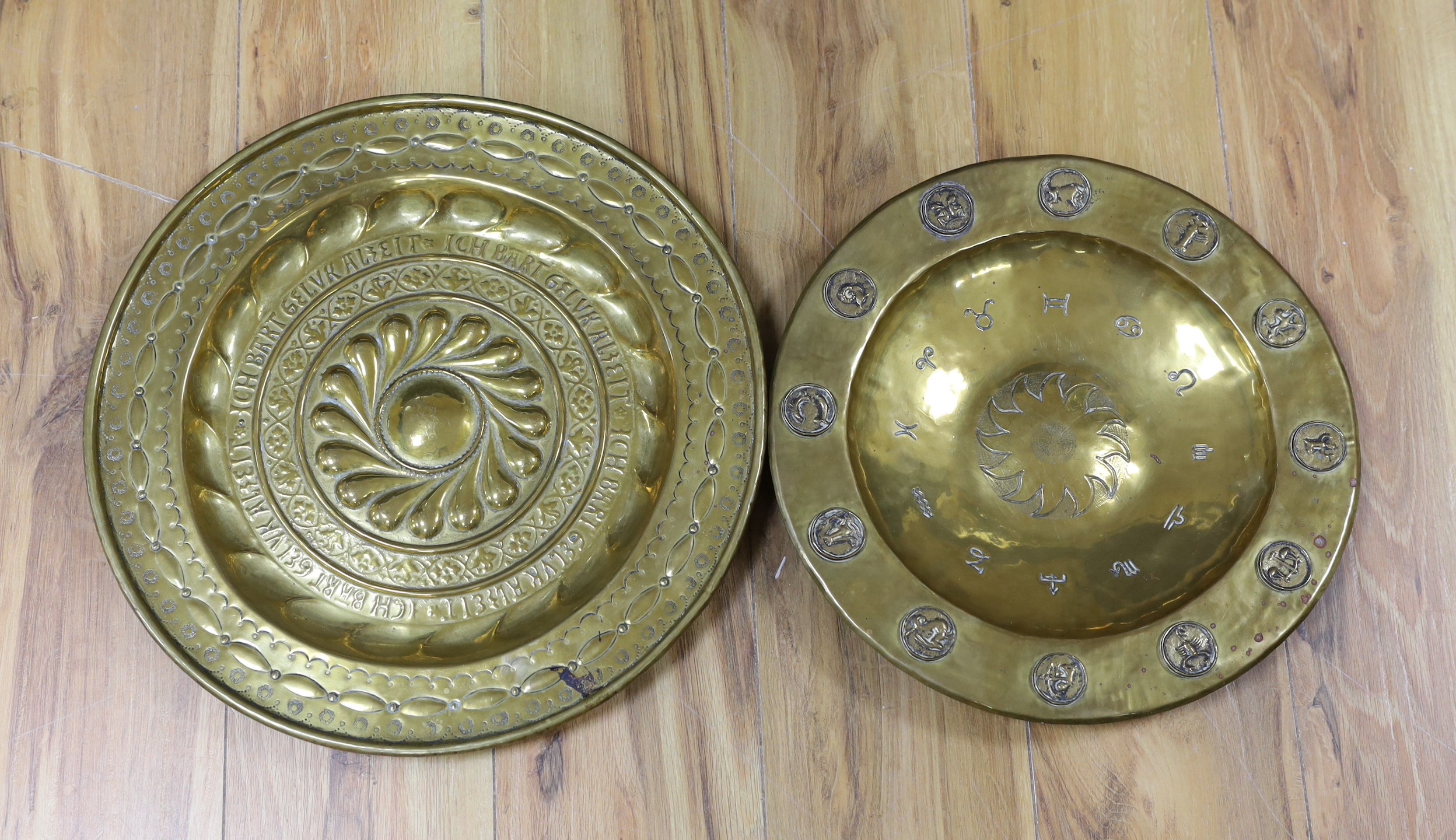 Two German brass alms dishes, 19th and 20th century, 41cm